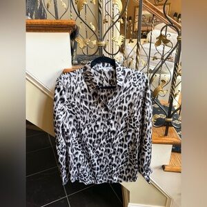 Chico’s NWOT Black Leopard blouse. Button front . Size 0 Never worn.